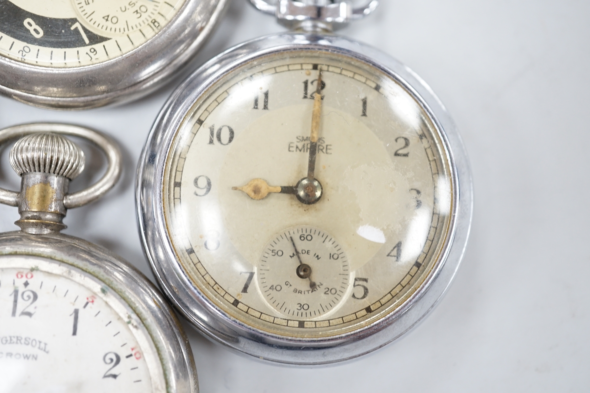 Ten assorted base metal pocket watches including Ingersoll and Smiths.